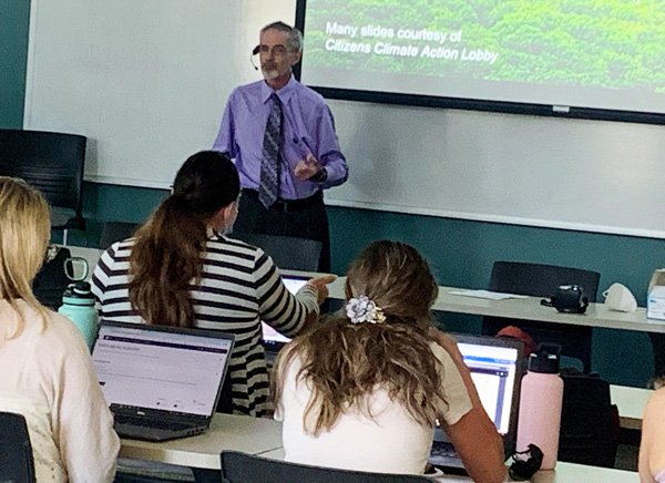 Tom teaching a class